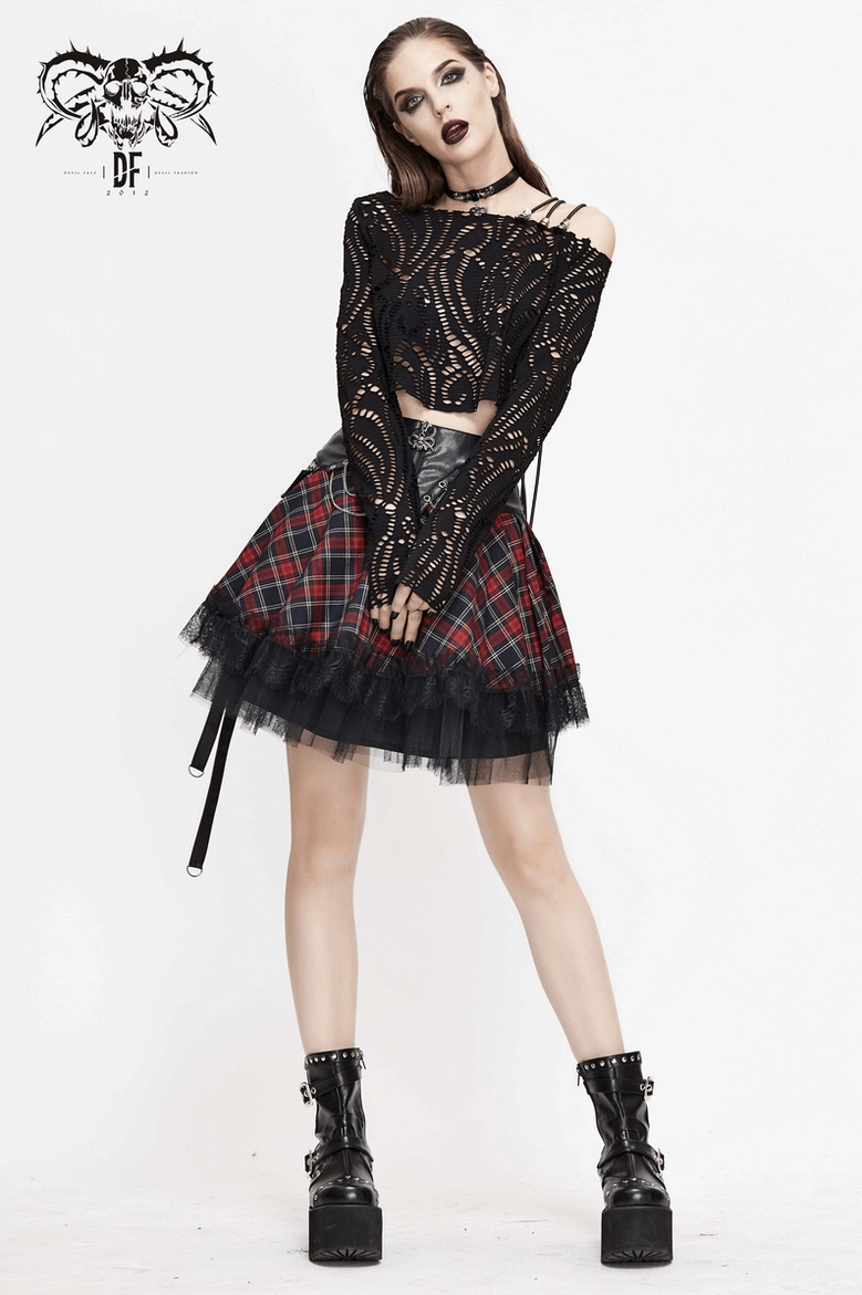 Red tartan gothic skirt close-up, lace inserts and mesh layering detail with industrial aesthetic
