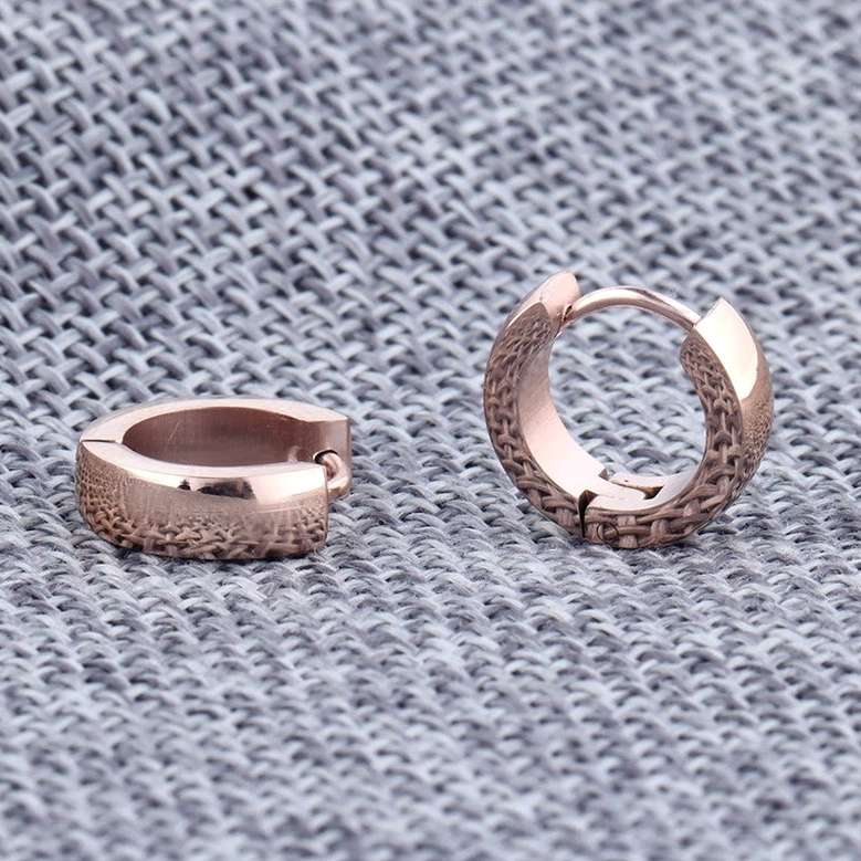 Rose gold textured stainless steel round stud earrings with woven surface detail, gothic dark fashion jewelry