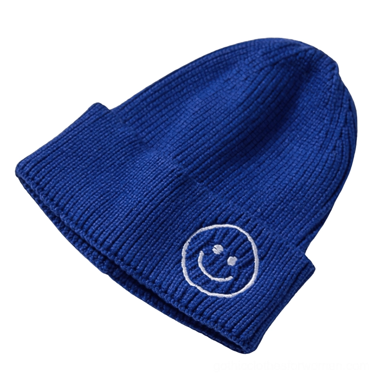 Royal blue smiley face knit beanie with white-outlined smiley logo, gothic dark aesthetic hat