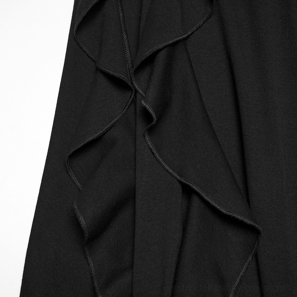 Close-up detail of asymmetric ruffled hem trim showing layered soft fabric edge and constructed ruffle design