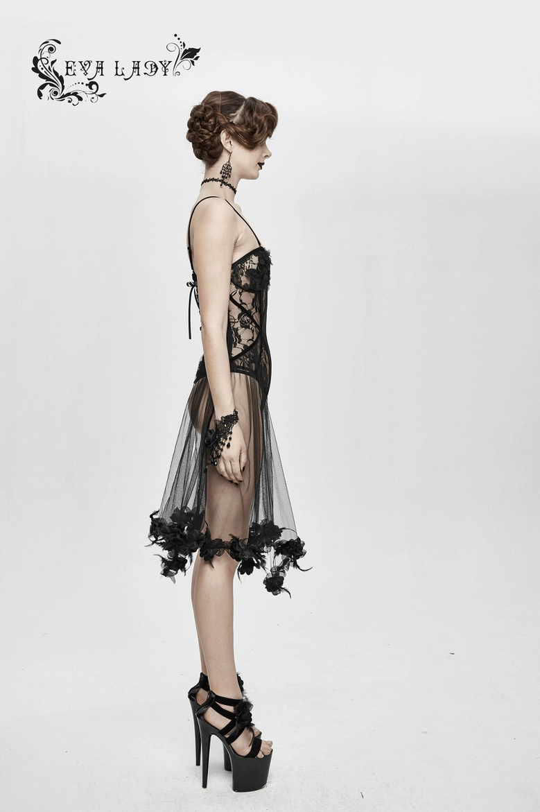 Black lace bodysuit with transparent sheer panels and decorative feather-trimmed skirt layer