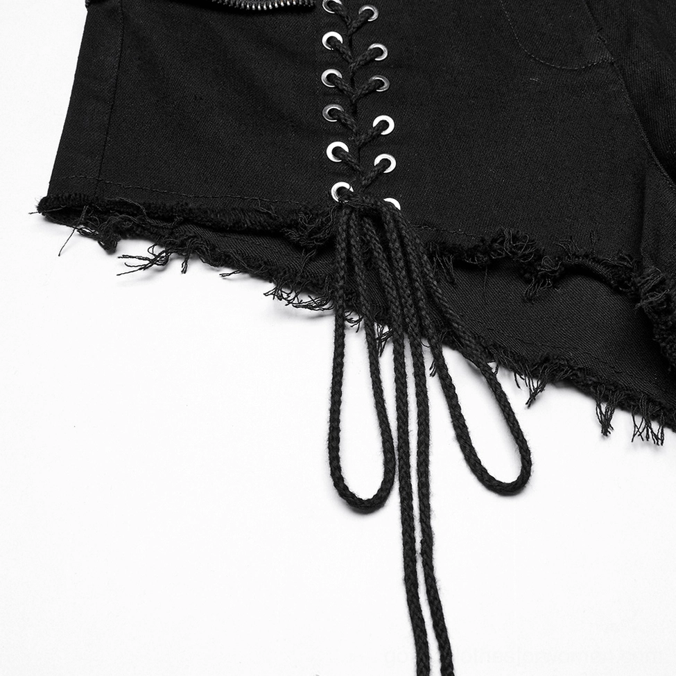 Close-up flat shot of shorts lace-up side showing metal lace eyelets, decorative rope tassels, and frayed fabric edge detailing