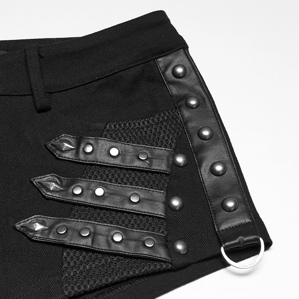 Detailed side view of spike stud straps, leather trim accent, mesh panel, and D-ring hardware on gothic shorts harness