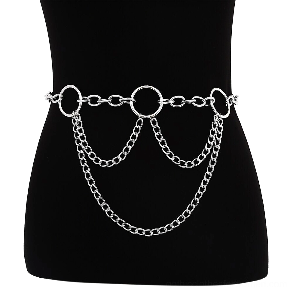 Symmetrical waist chain arrangement on torso form featuring central large O-ring and triple chain layers