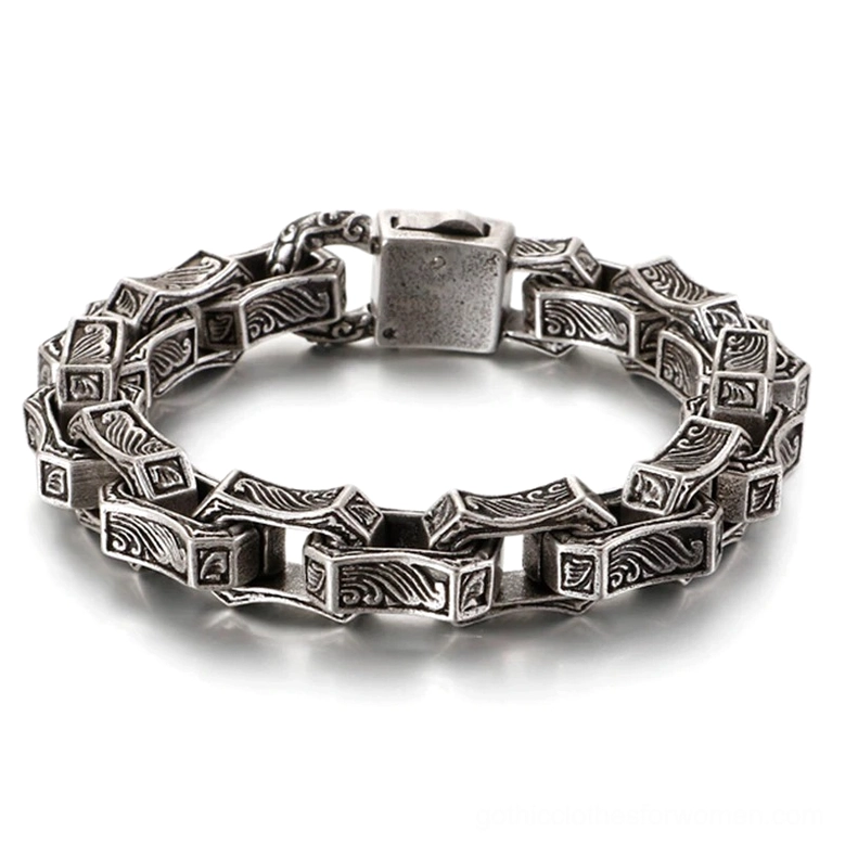 Silver tone gothic engraved chain bracelet with square link design studio flat lay showcase