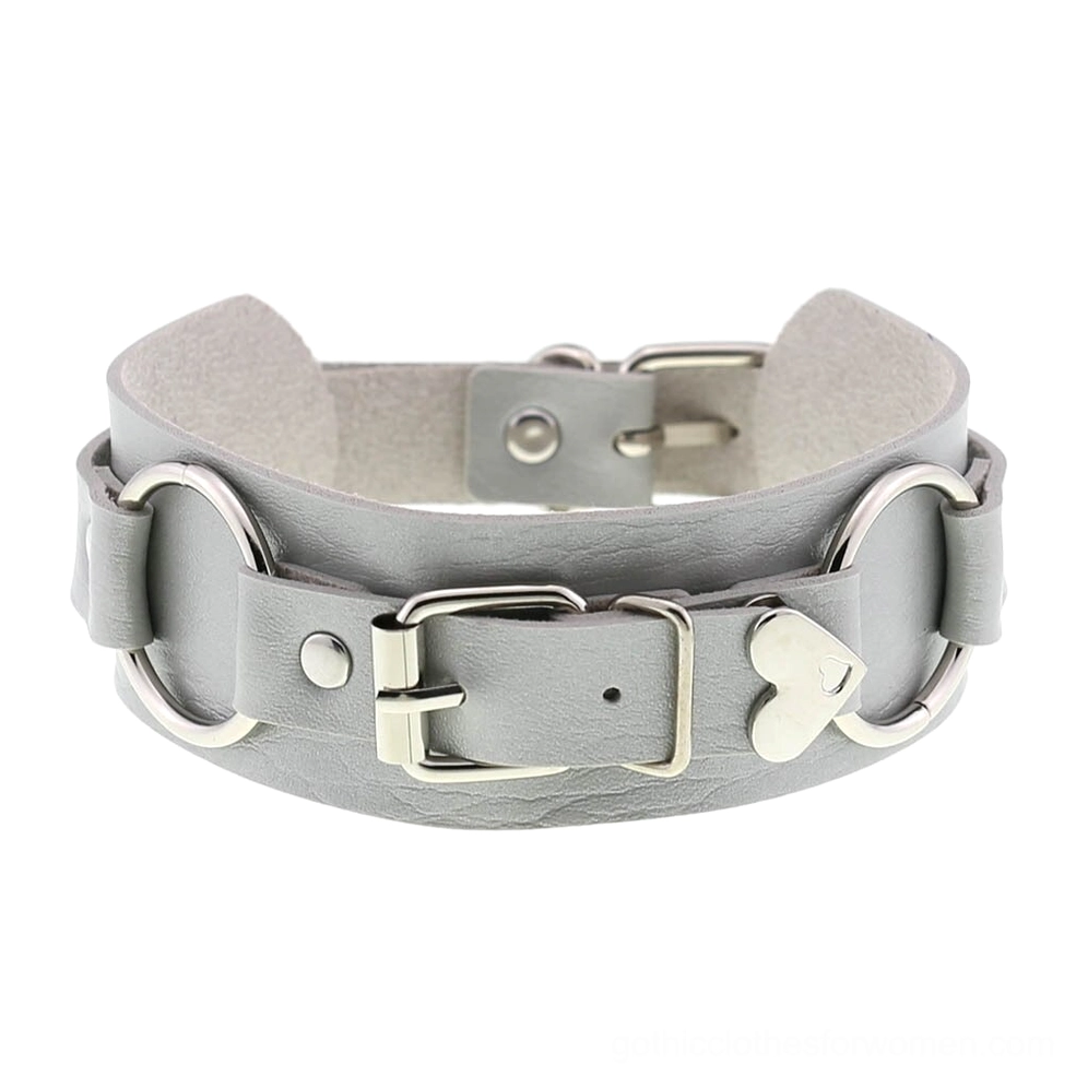Silver-tone leather choker with matching silver hardware and heart-shaped metal decor