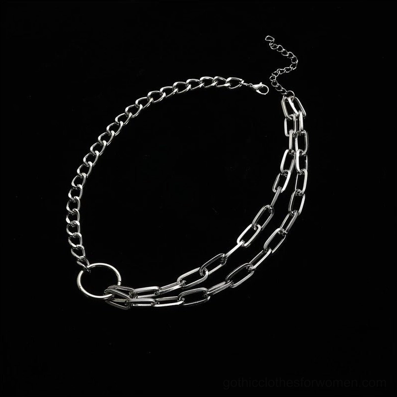 Silver mixed chain choker necklace flat lay photography, layered links with ring pendant, gothic aesthetic
