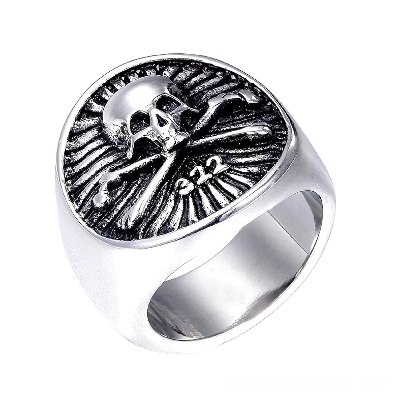 Silver skull pirate signet ring with radial striped texture and 322 engraving, top view close-up on white background