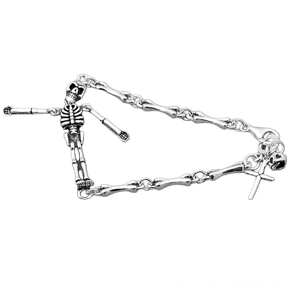 Sterling silver skeleton gothic bracelet with cross charm flat lay on white background, showcasing detailed bone-shaped chain links and oxidized silver finish