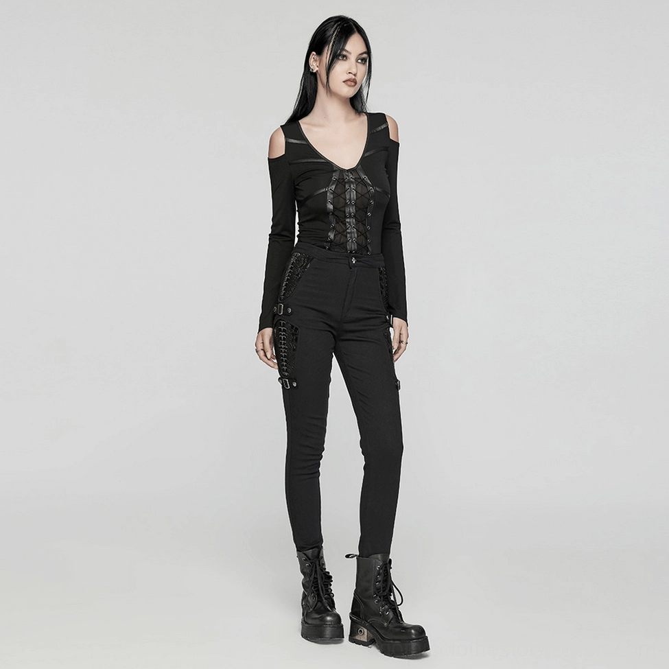 Full-body styling of skeleton gothic pants paired with punk cutout top and platform boots