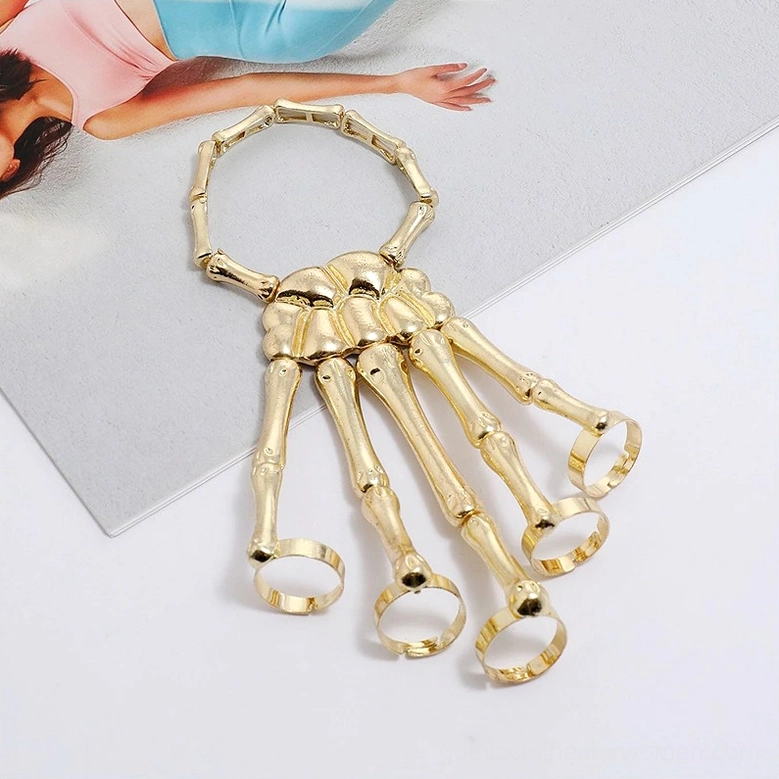Skeleton hand slave bracelet detailed view showing link chain construction and skeletal finger articulation