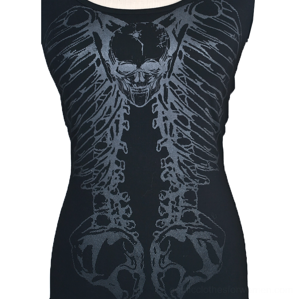 Close-up detail of grey skull ribcage graphic print on black knit fabric