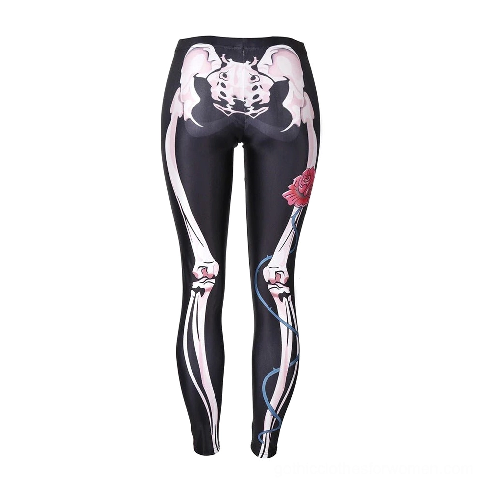 Gothic skeleton leggings flat lay rear view - showing back skeletal hip pattern and rose vine print