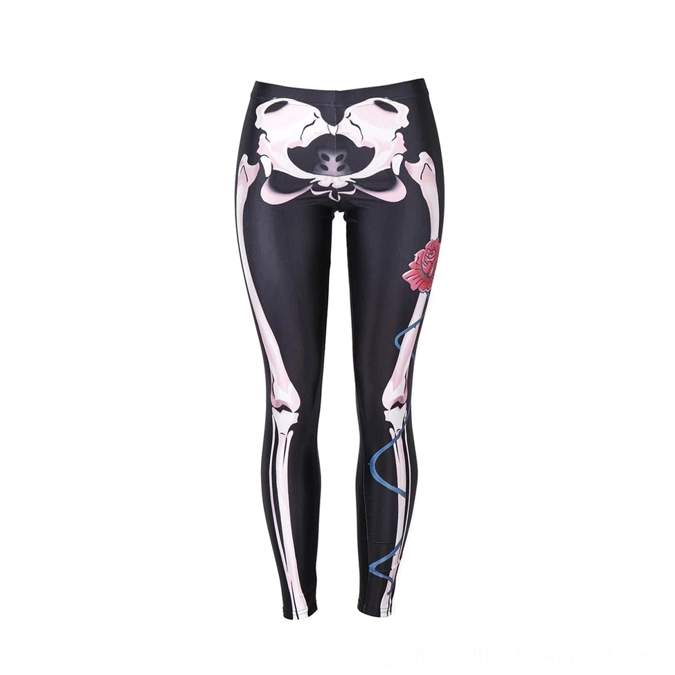 Skeleton rose print leggings flat lay front - black stretch knit fabric with digital skull design