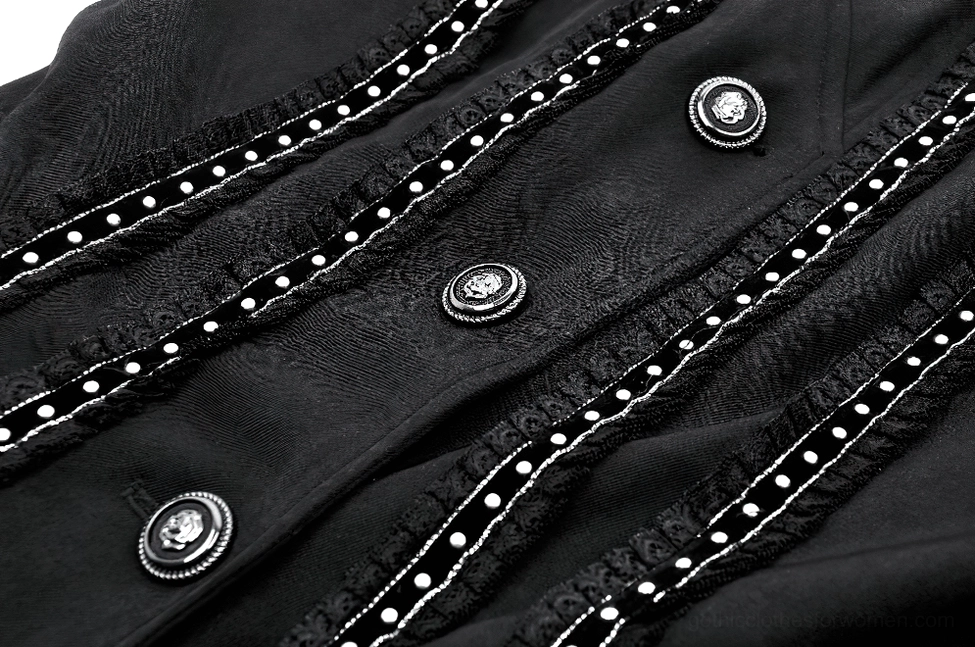 Close-up of skull-embellished metal buttons and chain-link lace trim on gothic coat front