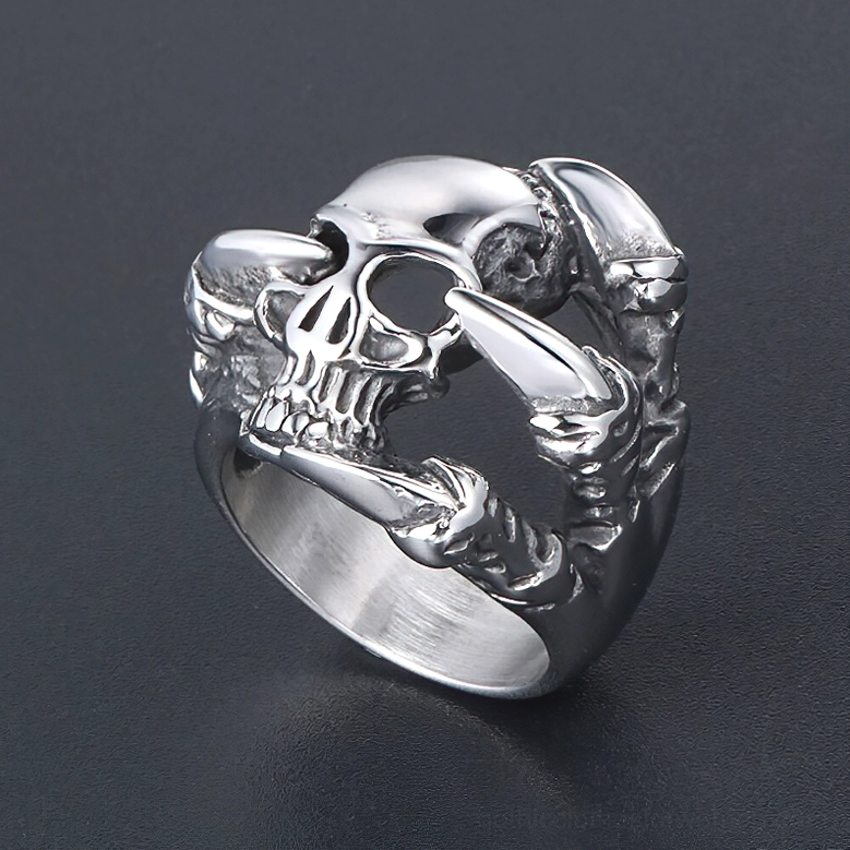 Skull claw ring right angle view showing dragon claw wrapped around skull design