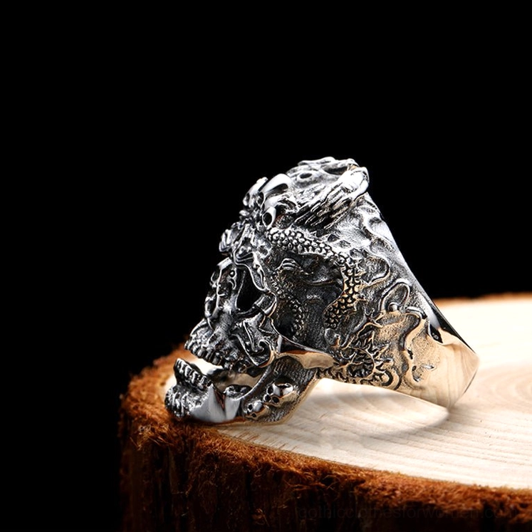 Biker skull and dragon ring rear profile showing wrapped dragon detail around skull motif on vintage silver