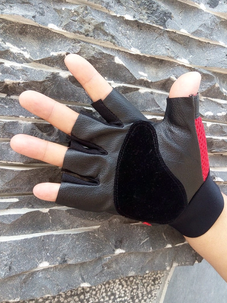 Skull rivet half-finger gloves in all three colorways displayed together showing black blue and red options