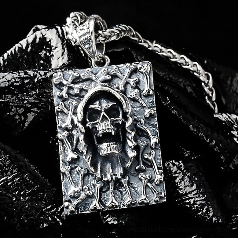 Dark gothic necklace pendant three-quarter view showcasing intricate bone-carved frame and distressed silver finish