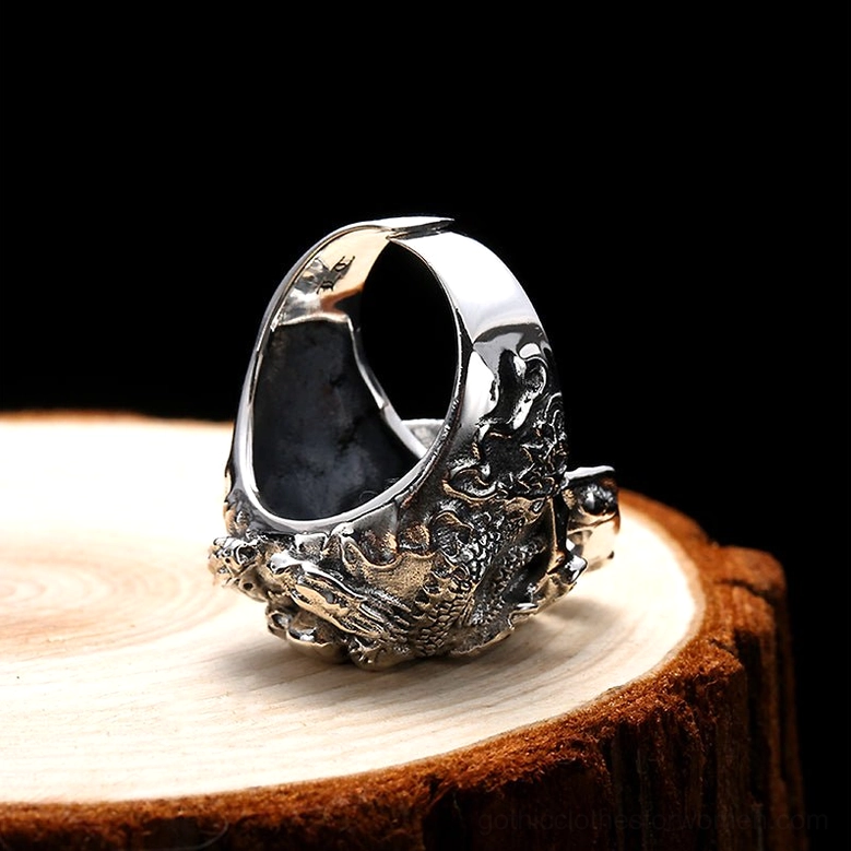 Inner band view of gothic skull ring showing smooth interior surface and intricate exterior skull carvings detail