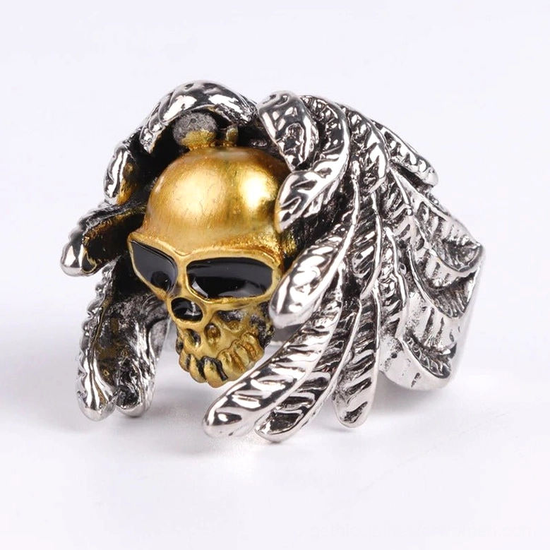 Feather wrapped skull ring lower left perspective, dual-tone metal carved wings, steampunk gothic