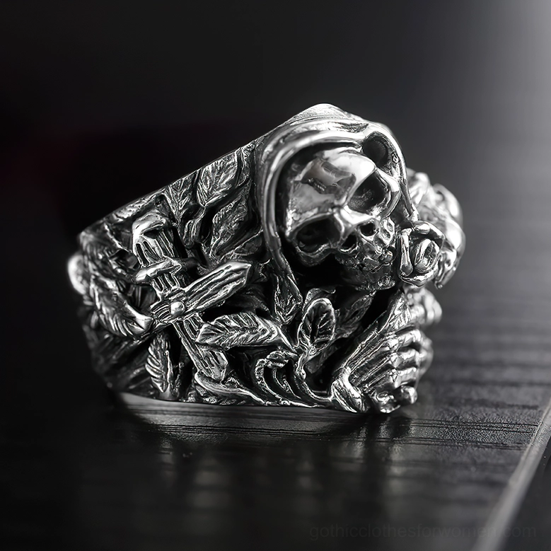 Grim reaper skull ring featuring sword engravings on band with detailed skull and rose accent accent