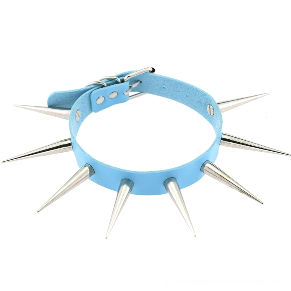 Sky blue faux leather choker necklace with metal spikes arranged flat on white background showing front detail