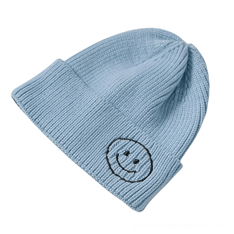 Sky blue smiley face embroidered knit beanie with black smiley, modern gothic winter accessory