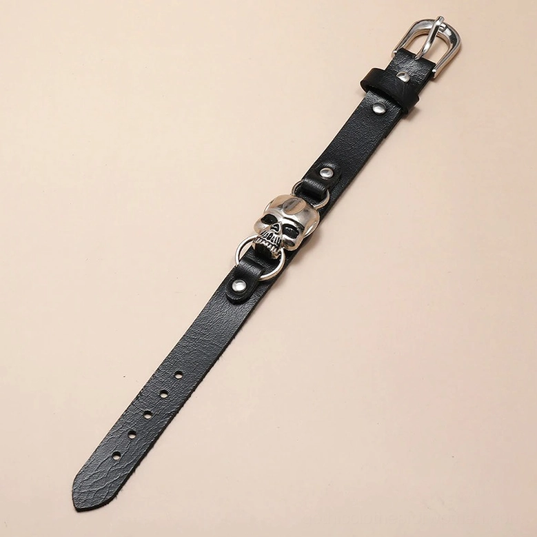 Narrow black leather gothic skull bracelet with multiple adjustment holes, alternative fashion jewelry