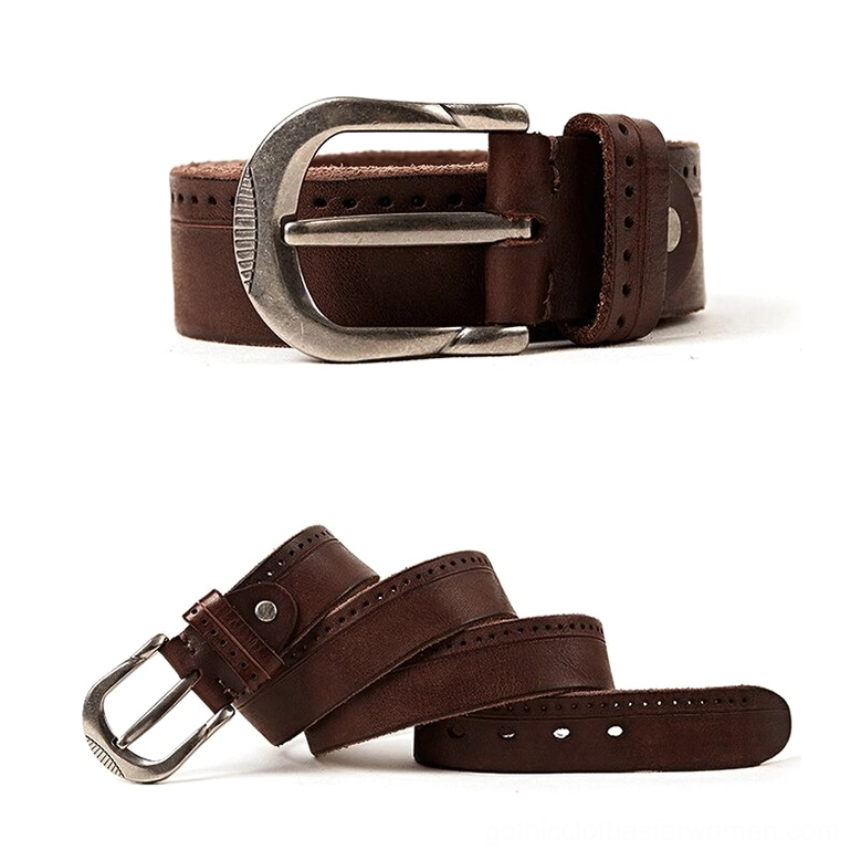 Slim dark brown leather gothic belt with compact silver metal buckle, flat lay overhead view