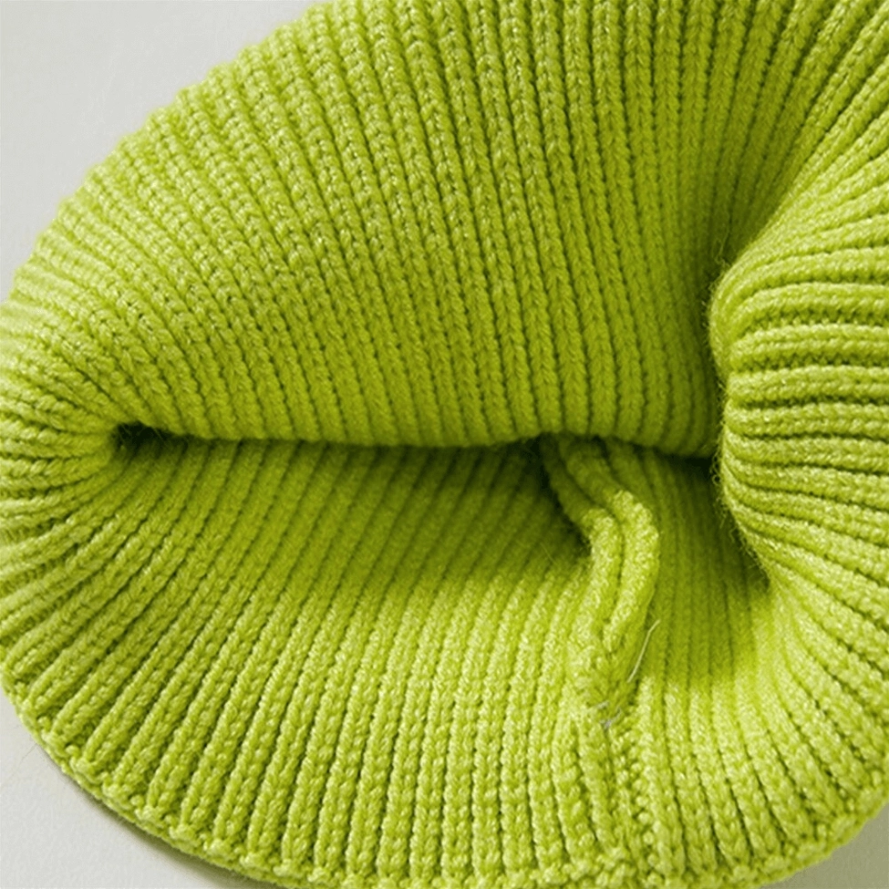 Smiley face embroidered knit beanie hero shot, dark aesthetic winter hat for alternative fashion