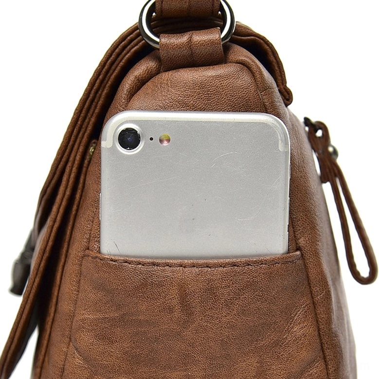 Soft leather gothic handbag strap attachment, crossbody bag construction detail