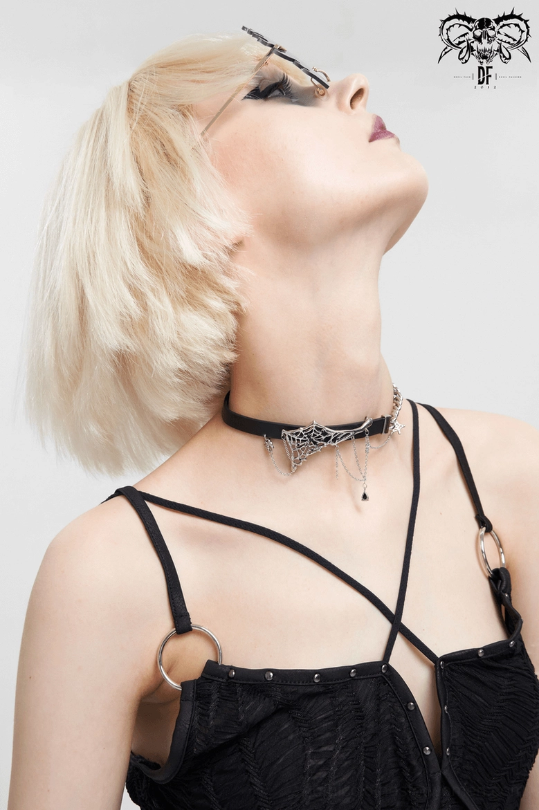 Spider web gothic choker styled on blonde model - left side upward angle with silver details