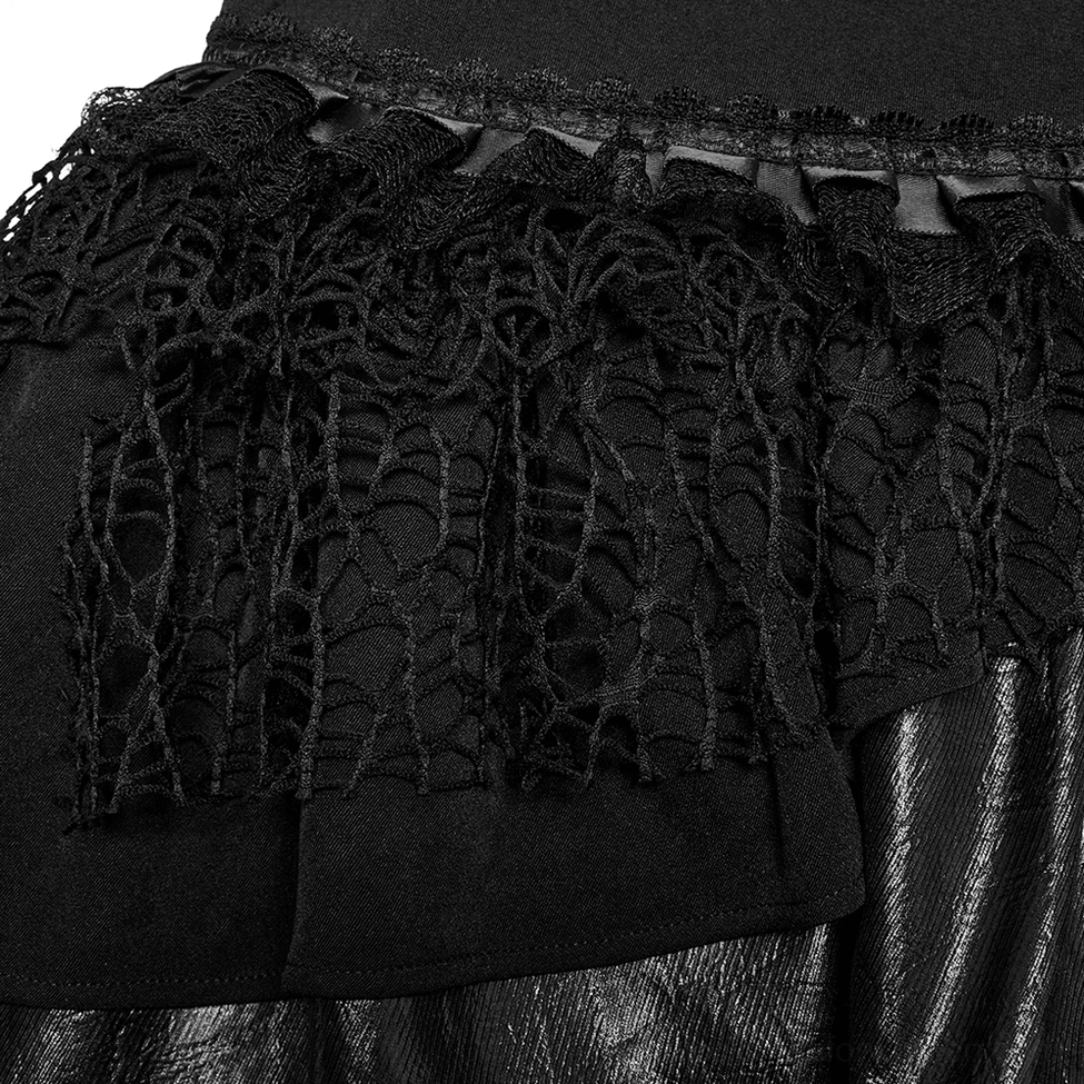 Spiderweb lace trim and ruffled layered mesh detail of black gothic mini skirt, close-up textile texture