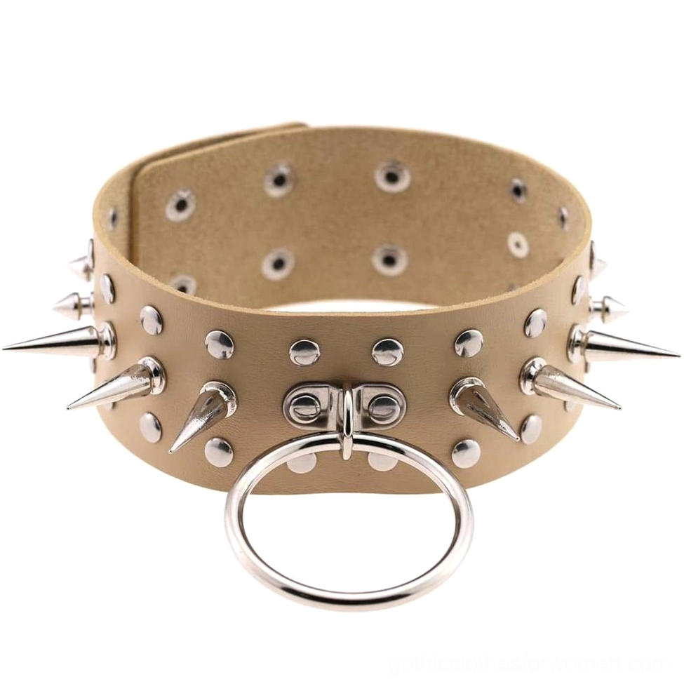 Spike studded faux leather gothic choker necklace close-up detail shot highlighting metal studs and construction quality