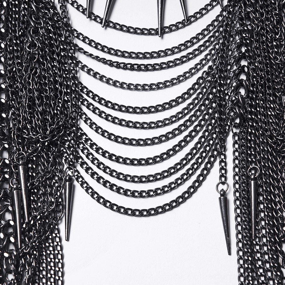 Detailed view of black spiked chain crown headpiece showing metallic gunmetal finish and chain tassel construction
