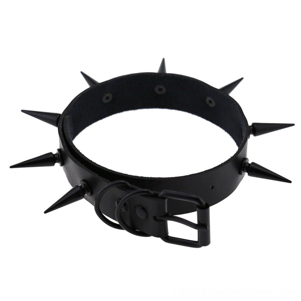 Spiked choker collar overhead flat lay displaying geometric spike stud pattern and ring shape design