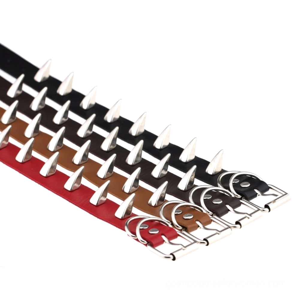 Multiple spiked leather gothic chokers in assorted colors displayed together showing color variety range