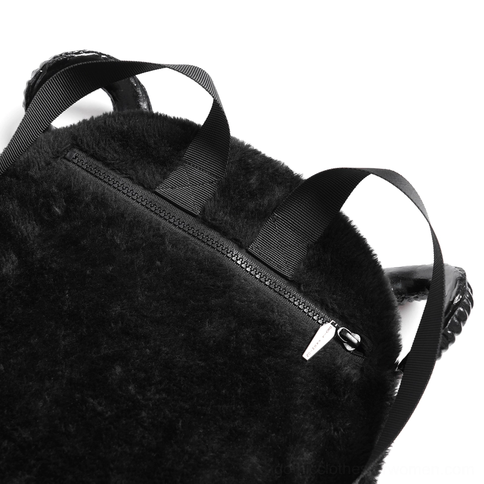 Detailed product shot of spiked demon backpack demonstrating construction quality and gothic design elements