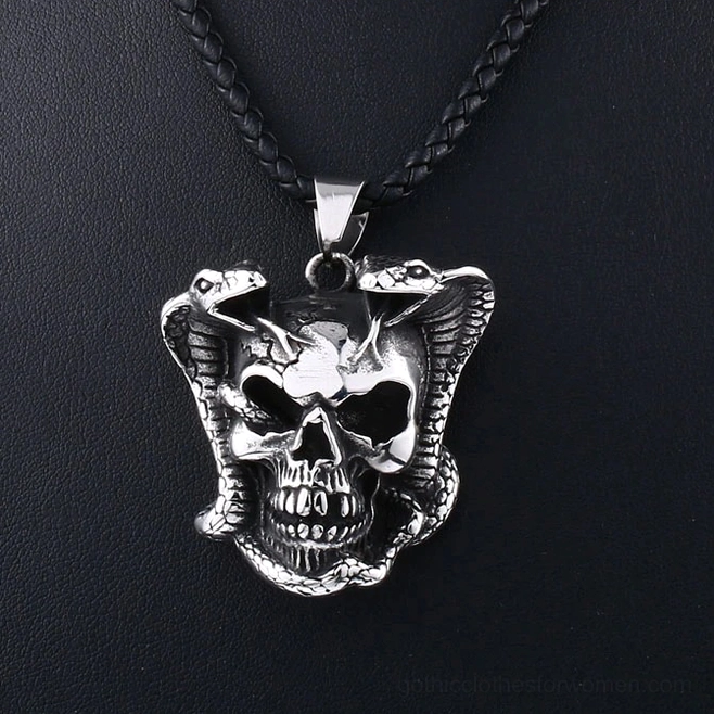Stainless steel cobra skull pendant - vintage patina finish showcasing artisanal craftsmanship details