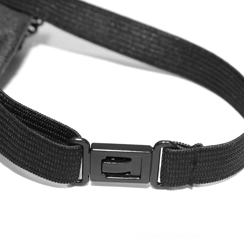 Top-down close-up of adjustable elastic woven strap and plastic release buckle mechanism on steampunk bow tie choker