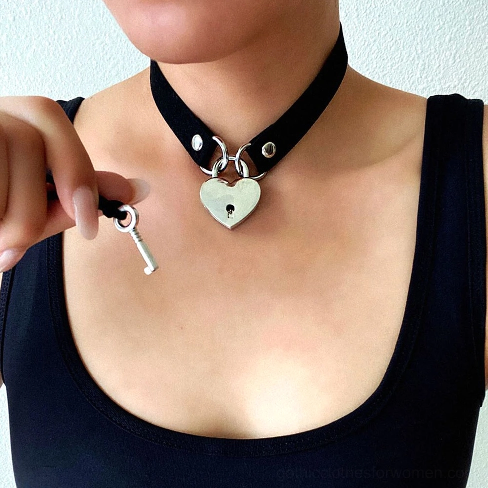 Steampunk heart lock choker detail shot showing intricate silver lock craftsmanship and leather strap