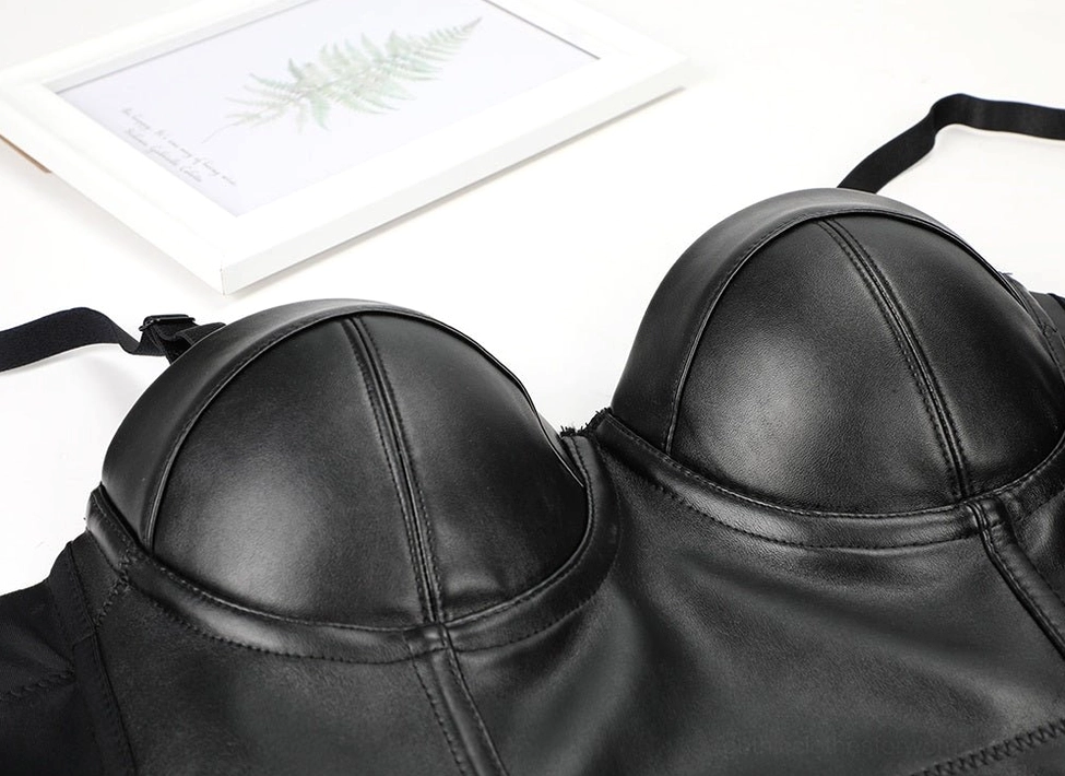 Black synthetic leather steampunk corset bra back detail view emphasizing hook closure system and architectural support