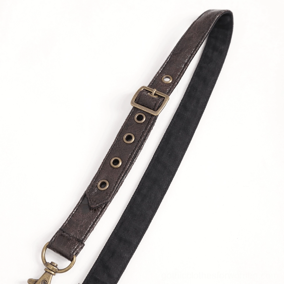 Steampunk gothic leather harness complete styling on alternative fashion model, worn with dark aesthetic clothing ensemble