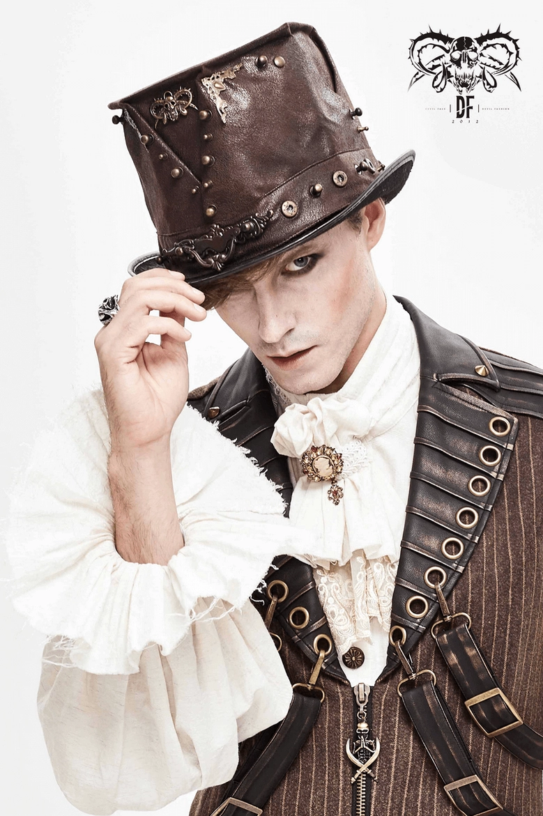 Brown leather steampunk top hat with metal skull ornament and rivets against neutral background, alternative fashion style accessory
