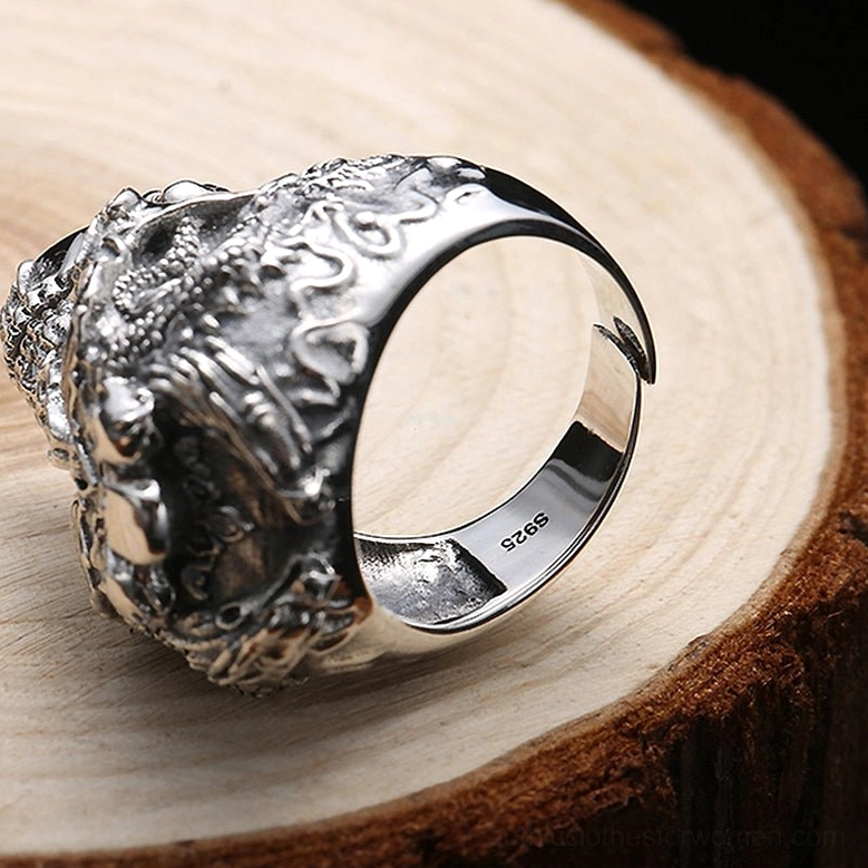 Sterling silver 925 hallmark stamp on skull ring inner band close-up, confirming genuine authentic metal composition