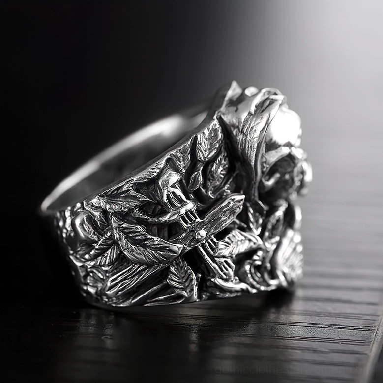 Sterling silver gothic skull ring full side view showing complete floral and sword engravings with curved band design