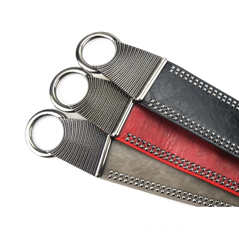 Multi-color studded wide belts collection showing black, red, and grey variants with matching silver hardware, angled flat lay view