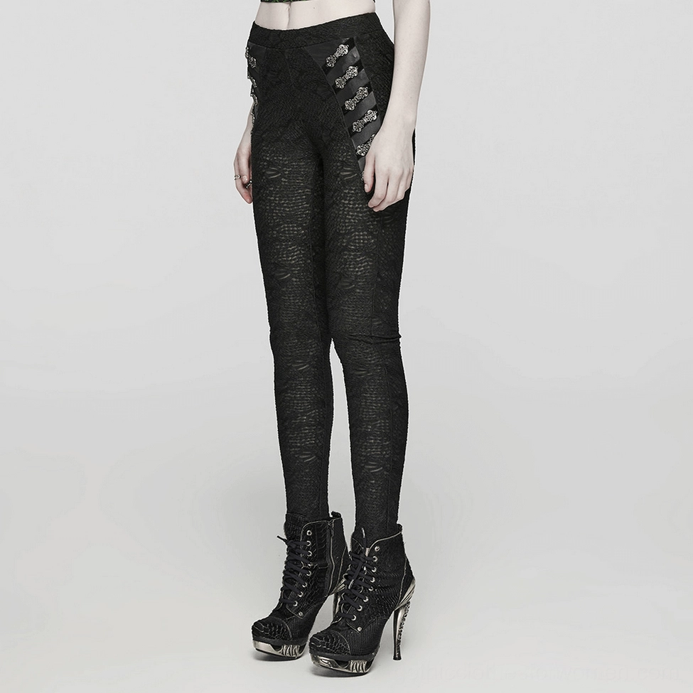 Black skull lace leggings styled view demonstrating how metal buckles and lace texture create sophisticated gothic aesthetic