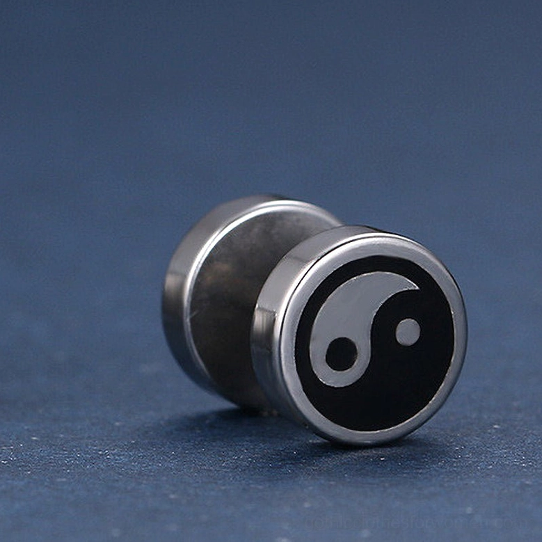 Single yin yang stud earring three-quarter view polished stainless steel gothic